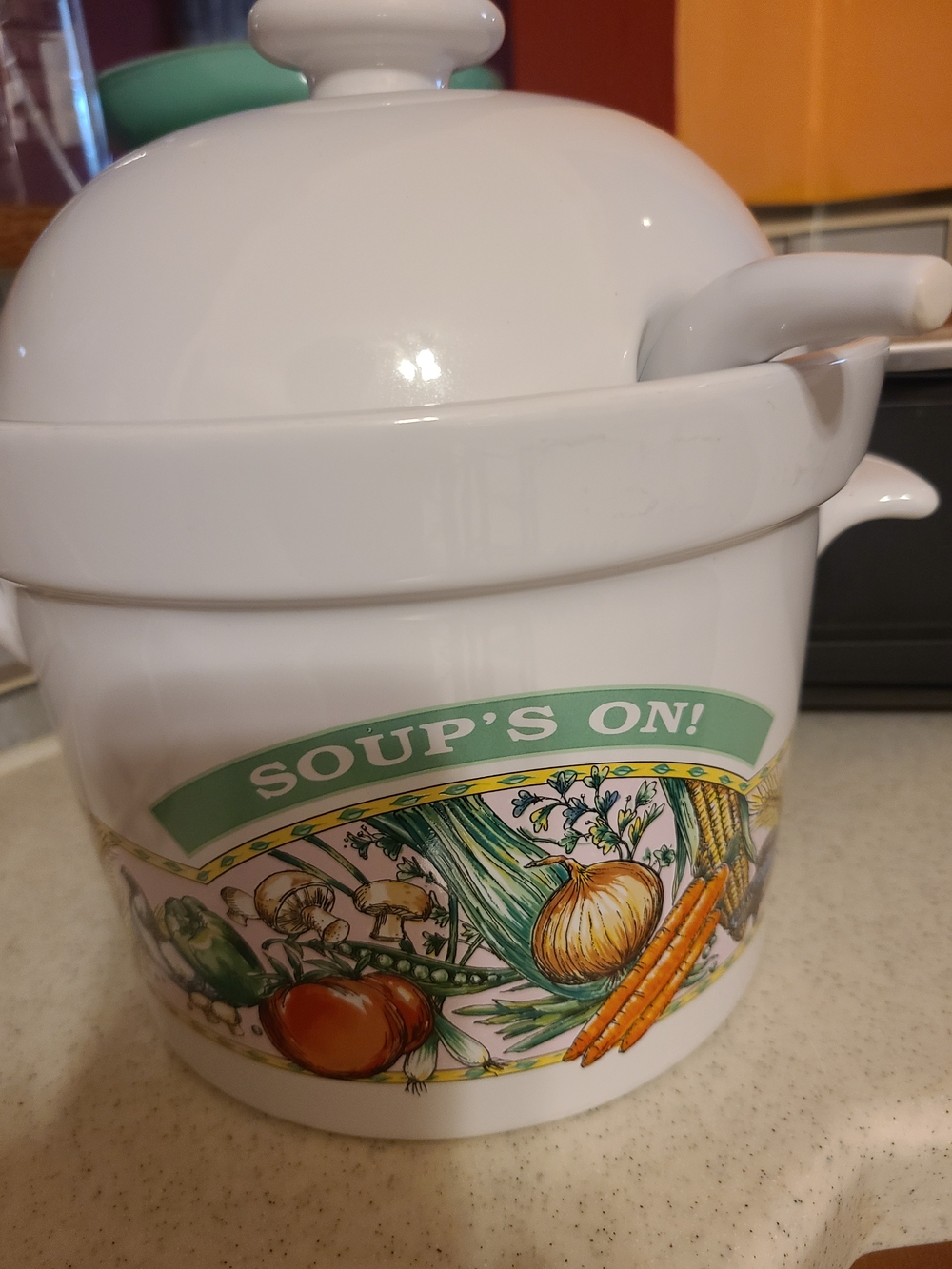 White Ceramic Soup Crock with Green 'Soup's On!' Banner and Vegetable Motif
